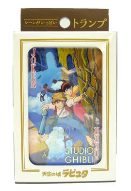 Castle in the Sky Playing Cards featuring vibrant characters from Studio Ghibli. The artistic design showcases a scene with a boy and a girl in a fantastical setting, highlighting the imaginative theme of the game. The packaging is elegantly designed with clear card identifiers and branding.