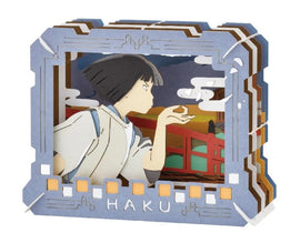 Paper Theater Haku from Spirited Away by Ensky. This intricate DIY kit features a layered design showcasing the iconic character Haku in a colorful, scenic backdrop. Perfect for fans of Studio Ghibli and paper crafts.