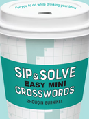 Sip & Solve Easy Mini Crosswords features a stylish coffee cup design with grid patterns and the title prominently displayed. A perfect pairing for your favorite brew, this crossword book invites you to challenge your mind while enjoying your drink.