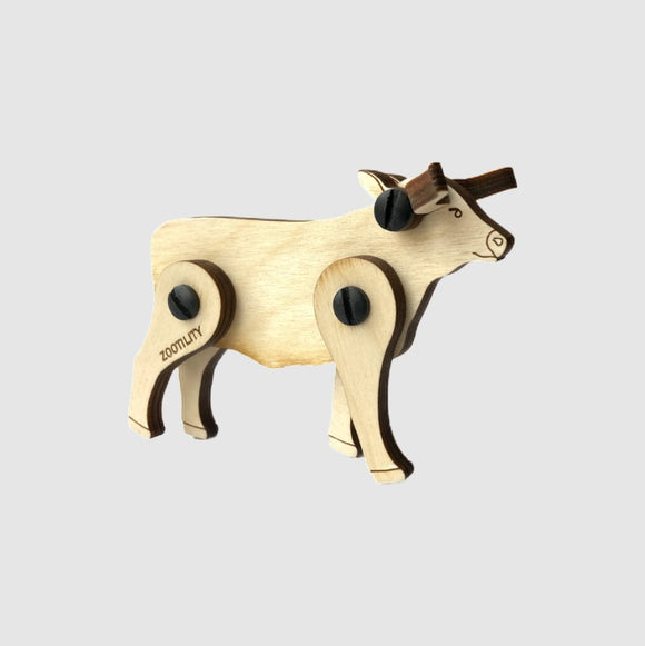 Loopets Steer DIY kit by Zootility, featuring a wooden steer with movable joints. The steer is crafted from light wood with black accents, designed for interactive fun and creativity.