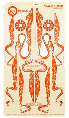 JCR Work's Mollusca Giant Squid DIY kit features intricately designed cutouts of a giant squid in bright orange. The kit includes detailed instructions and is crafted from durable material, perfect for creative projects and educational purposes.