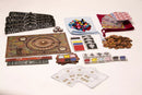 The Damask game by Radical 8 Games features an intricately designed board, colorful game pieces in a fabric pouch, playing cards, and various tokens. The game components are arranged neatly, showcasing a vibrant mix of colors and textures, inviting players to immerse themselves in a strategic adventure.