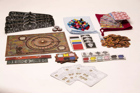 The Damask game by Radical 8 Games features an intricately designed board, colorful game pieces in a fabric pouch, playing cards, and various tokens. The game components are arranged neatly, showcasing a vibrant mix of colors and textures, inviting players to immerse themselves in a strategic adventure.