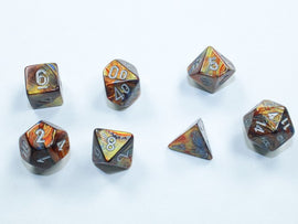 A set of Mini Lustrous RPG Dice in gold and silver colors by Chessex. The dice include various shapes such as d20, d6, d8, and d10, showcasing a shimmering finish with vibrant hues, perfect for tabletop gaming.