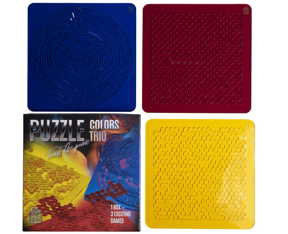 The Puzzles Color Trio by EscapeWelt features three distinct colored mechanical puzzles: a blue circular maze, a red intricate design, and a yellow hexagonal pattern, arranged around a vibrant box that showcases the game's branding and emphasizes its three exciting games.
