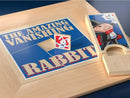 Marvin's Treasured Magic Tricks Wooden Set featuring a colorful wooden tray with puzzle pieces and a wooden figure of a magician with a vanishing rabbit. The tray displays the title 'The Amazing Vanishing Rabbit' in bold letters, showcasing the magical theme.