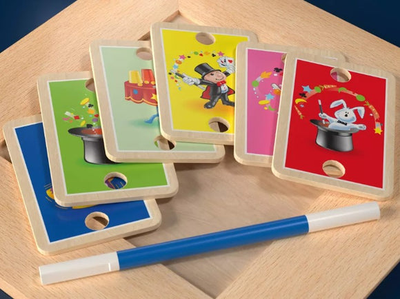 Marvin's Treasured Magic Tricks Wooden Set featuring colorful wooden cards with playful magic-themed designs, including top hats and rabbits, alongside a blue magic wand for performing tricks.