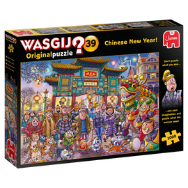 Wasgij Original 39 Chinese New Year jigsaw puzzle box featuring a vibrant illustration of a bustling festival scene. The design includes colorful characters, a dragon dance, cherry blossom trees, lanterns, and traditional decorations that capture the festive atmosphere of the Chinese New Year. The puzzle contains 1000 pieces and encourages imaginative thinking.