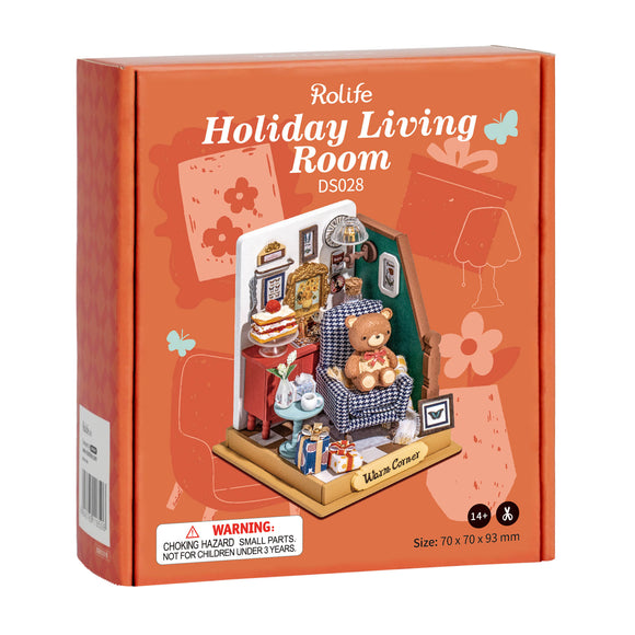 The DIY Holiday Living Room by Robotime is a charming miniature kit featuring a cozy living room scene. It showcases a comfy armchair, a teddy bear, delicious treats on a table, holiday decorations, and more, perfect for holiday-themed crafting. The vibrant packaging captures the festive spirit with playful designs and clear product information.