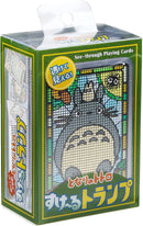 Transparent Totoro Playing Cards by Ensky, featuring a clear design and colorful illustrations of Totoro. The packaging shows a playful design and highlights the see-through feature, making these playing cards a unique addition to any card game collection.