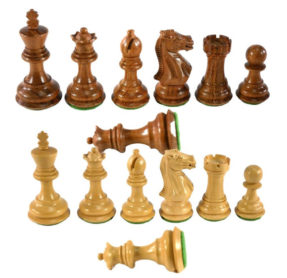 A set of 3-inch Kikkerwood and Natural chess pieces with chamfered bases displayed in two rows. The wooden chessmen feature a rich brown color and a natural finish, showcasing the king, queen, bishops, knights, rooks, and pawns. Each piece has a velvety green base, enhancing their elegant appearance. Perfect for chess enthusiasts and collectors.