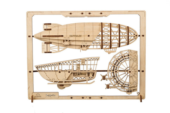 UGears 2.5D Zeppelin DIY kit featuring intricately designed wooden pieces of a vintage airship, displayed in a frame. Ideal for crafting enthusiasts and collectors.
