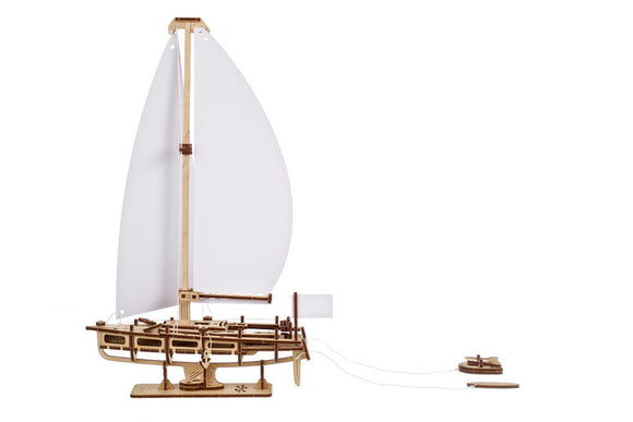 UGears 3D Ocean Beauty Yacht DIY kit featuring a detailed wooden sailboat with a white sail and intricate deck design, perfect for model enthusiasts and craft lovers.