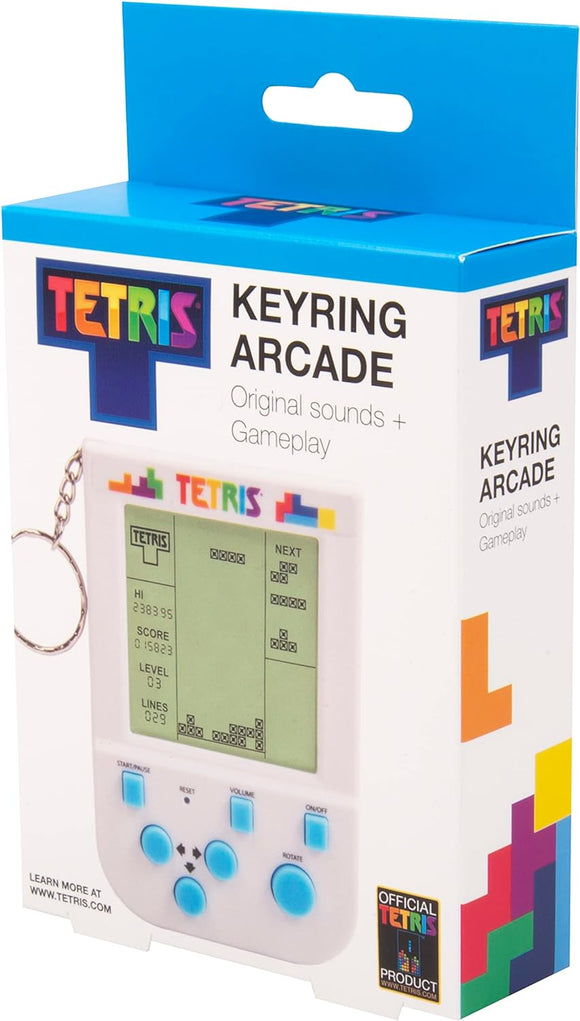 A Tetris Keyring Arcade Game from Fizz Creations Inc. The handheld device features a green screen displaying gameplay with Tetris blocks. The buttons for navigating and adjusting settings are positioned below the screen, with a keyring attached for portability. The product packaging showcases colorful Tetris branding and highlights original sounds and gameplay.