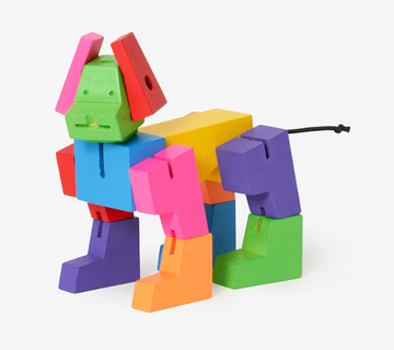 Cubebot Milo Micro in vibrant colors, featuring articulated wooden limbs and a playful animal design. This mechanical puzzle encourages creativity and fine motor skills.