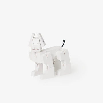 Cubebot Milo Micro is a cute mechanical puzzle designed in the shape of a dog. It features a white finish with articulated limbs and a tail made of flexible material, offering fun and engaging play while encouraging creativity and problem-solving skills.