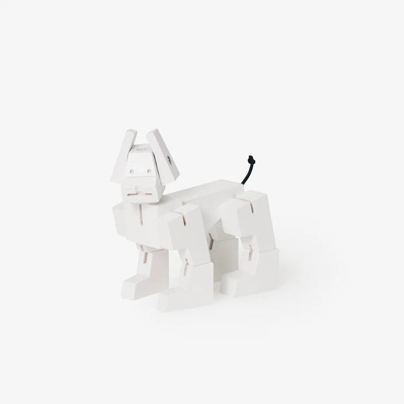 Cubebot Milo Micro is a cute mechanical puzzle designed in the shape of a dog. It features a white finish with articulated limbs and a tail made of flexible material, offering fun and engaging play while encouraging creativity and problem-solving skills.