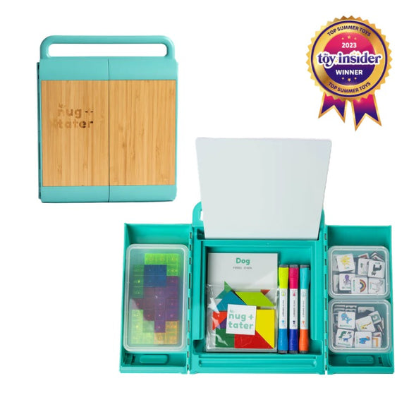 NugLug Complete Set by Nug + Tater, featuring a turquoise carrying case with bamboo accents. Inside, it includes colorful building blocks, markers, game cards, and other learning materials, all organized for easy access.