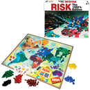 The 1980's Edition of the Risk board game by Winning Moves, featuring a detailed map of the world game board, colorful plastic army pieces in various colors including red, yellow, green, and black, dice, and risk cards. The game box is shown in the background, adorned with the title 'RISK' prominently displayed.