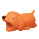 A cute, orange Cable Bite Dog accessory designed for iPhone charging cables, featuring a playful design with a wide mouth and a wagging tail. Perfect for protecting cables from damage and adding a touch of fun to your tech setup.