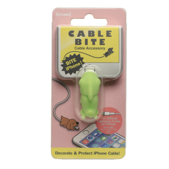 A Cable Bite accessory depicting a chameleon designed to fit onto an iPhone charging cable. The product is displayed in packaging with a light pink background, featuring illustrations that show how it protects and decorates the cable.