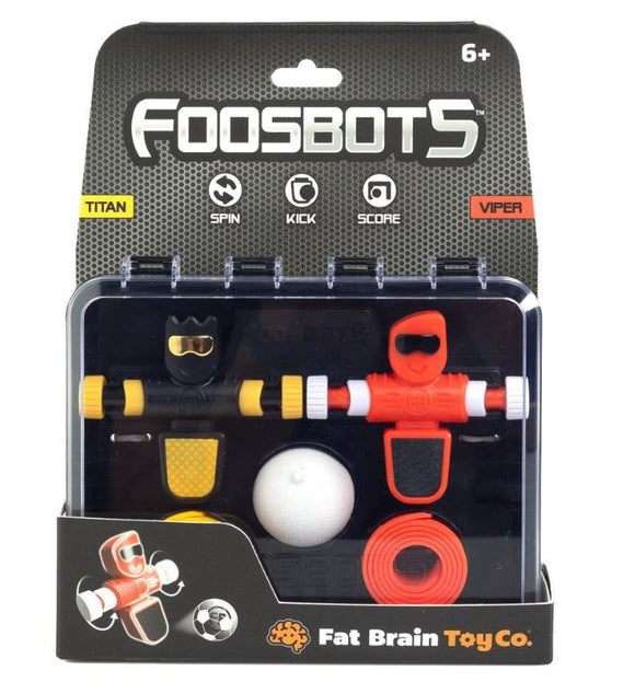 Foosbots 2-pack game by Fat Brain features two colorful action figures, a ball, and various components for an interactive tabletop foosball experience. Ideal for ages 6 and up, this game encourages skill building and fun with friends and family.