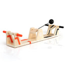 The VolleyShot game by Fat Brain features a wooden design with colorful accents. It includes handles for gameplay and a ball on a string for striking. The game promotes hand-eye coordination and agility while providing fun for all ages.