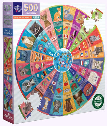 Eeboo's 'Cats of the World' 500-piece round jigsaw puzzle features colorful illustrations of various cat breeds from around the globe. Each segment showcases a different breed, labeled with its name and country. The puzzle comes in a square box that includes one missing piece, enhancing the interactive experience for cat lovers and puzzle enthusiasts alike.
