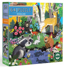 Eeboo Woodland jigsaw puzzle box featuring a vibrant illustration of woodland animals including a raccoon, deer, bear, rabbit, and a variety of colorful plants. The puzzle contains 64 pieces and is suitable for ages 5 and up. The artwork showcases a lively natural scene with a river, trees, and flowers, promoting creativity and learning.