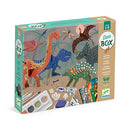 The World of Dinosaurs DIY kit by DJECO. The colorful packaging features various dinosaur illustrations including a T-Rex, pterodactyl, and stegosaurus, along with art supplies for creative activities. Designed for children aged 6 to 10, this engaging kit promotes hands-on learning and imaginative play.