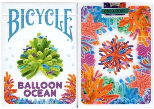 Bicycle Balloon Ocean playing cards featuring a vibrant design with colorful sea creatures and balloons. The front displays the Bicycle logo and the phrase 'BALLOON OCEAN' prominently, while the back showcases an intricate pattern of starfish and underwater elements in bright colors.