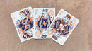 A set of Bicycle Snail (Orange) Playing Cards, displaying three royal face cards: the King, Queen, and Jack, artistically illustrated in vibrant orange and navy designs. The cards feature whimsical snail motifs and ornate patterns, making them a unique addition to any card game collection.