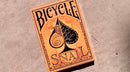Bicycle Snail (Orange) Playing Cards packaged in an intricately designed box featuring a stylized snail and black leaf artwork against an orange background.