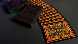 Goketsu Craft Playing Cards featuring intricate designs in vibrant colors, displayed with a deck and fan of cards showing ornate patterns and details. The cards are crafted by Card Experiment, presenting a unique gaming experience.