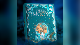 Close-up view of the 'Under the Moon' playing cards by Jocu, featuring an intricate teal design with moon and ocean motifs. The card box displays elegant graphics and is placed against a soft, dreamy background.