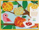 A colorful DIY kit product image featuring a nature painting theme with marbles. The image showcases vibrant apples in yellow and orange hues on a tree with green leaves, alongside a cute pink bird. The kit includes paints and instructions for children aged 3 to 6 to create their own marble paintings.