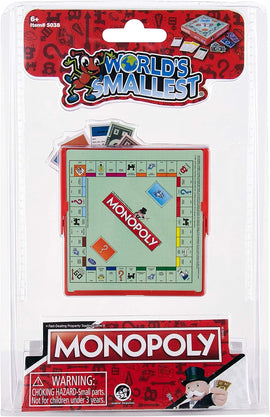 World's Smallest Monopoly game by Super Impulse. It features a miniature Monopoly board inside a red casing, complete with tiny game pieces and money. The packaging shows a colorful design with the brand logo and warning for small parts.