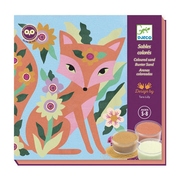 Colorful art kit featuring a fox design by Tara Lilly. The kit includes containers of colored sand in various shades, ideal for creating vibrant artwork. The packaging showcases a playful illustration of a fox surrounded by flowers and foliage, perfect for children aged 5-8.
