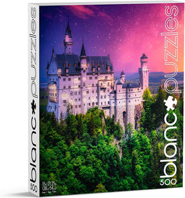 Blanc Puzzles Neuschwanstein At Dusk jigsaw puzzle box featuring a stunning image of Neuschwanstein Castle at dusk, set against a purple sky filled with stars and surrounded by lush greenery. The box measures 15 x 21.25 inches and contains 500 pieces, perfect for puzzle enthusiasts and fans of beautiful landscapes.
