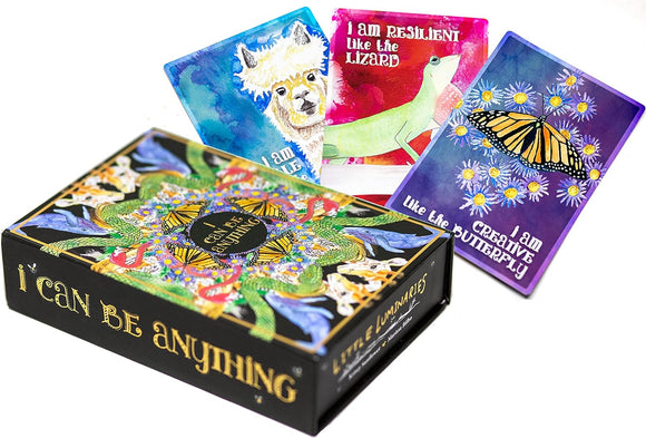 A colorful box of 'I Can Be Anything' by Little Luminaries, showcasing vibrant cards featuring inspiring animal illustrations and affirmations like 'I am resilient like the lizard' and 'I am creative like the butterfly.' The detailed box design includes a floral and mythical theme.