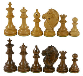 A detailed image of the 4" Flower Hippo Chessmen set made from acacia and boxwood. The set features intricately designed chess pieces including kings, queens, bishops, knights, rooks, and pawns, showcasing a mix of light and dark wood tones. Each piece has a smooth finish and felt bases for a premium quality touch.