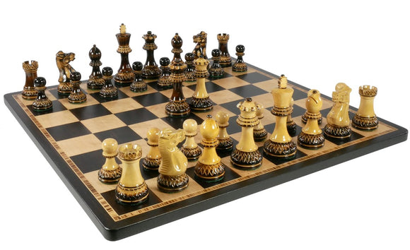 Intricately designed chess set featuring 3.75-inch king pieces crafted from burnt parker wood. The pieces are displayed on a stylish ebony and birdseye maple board, offering an elegant centerpiece for any game room. Ideal for chess enthusiasts and collectors alike.