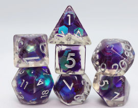 A set of Melusine Marvel RPG dice featuring a mix of purple and teal colors with transparent effects. The dice include a d20, d12, d10, d8, d6, and d4, all with silver numbers that are clearly visible. The dice are stacked in a visually appealing arrangement, showcasing their intricate design and vibrant hues.