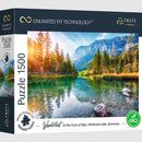 Wanderlust At the Foot of the Alps jigsaw puzzle featuring a stunning scene of Hintersee Lake in Germany, surrounded by majestic mountains and lush pine trees. This 1500-piece puzzle captures the vibrant colors of a serene landscape reflecting on the lake's surface, perfect for nature lovers and puzzle enthusiasts alike.