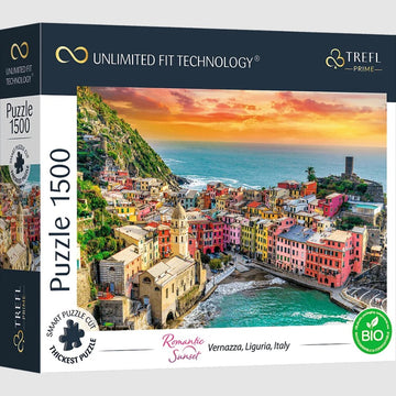 Trefl jigsaw puzzle featuring a vibrant sunset over Vernazza, Liguria, Italy. The image showcases colorful buildings along the coastline, set against a backdrop of hills and a serene sea. Puzzle contains 1500 pieces and boasts Unlimited Fit Technology for a perfect fit.