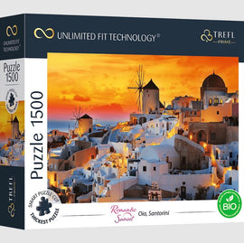 A jigsaw puzzle box featuring a stunning sunset view of Oia, Santorini. The artwork depicts white architecture and windmills bathed in warm golden hues. The box states it contains 1500 pieces and highlights Trefl's Unlimited Fit Technology for a seamless assembly experience.
