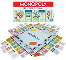 A complete set of Monopoly: Classic Edition game by Hasbro, featuring the game board, colorful property cards, play money, and dice. The box displays the iconic Monopoly branding and 'The 1980's Edition' label. The game board shows various properties, with the 'GO' space clearly visible.