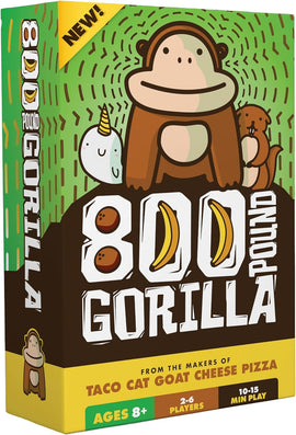 The box of '800 Pound Gorilla' by Dolphin Hat Games featuring a playful cartoon gorilla surrounded by whimsical characters like a narwhal and a beaver. The packaging is bright and colorful, showcasing the game's fun aesthetic. Suitable for 2-6 players aged 8 and up, with a gameplay duration of 10-15 minutes.