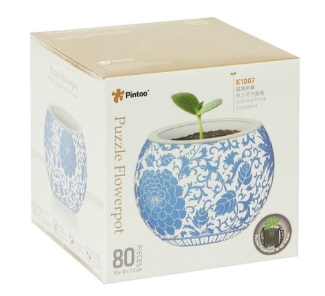 P-Pot: K1007 Oriental Floral O jigsaw puzzle by Pintoo featuring a beautifully designed flowerpot with intricate oriental floral patterns. The boxed puzzle contains 80 pieces, suitable for decoration once completed. The plant in the pot symbolizes growth and creativity, making it an ideal gift for puzzle enthusiasts.