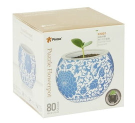 P-Pot: K1007 Oriental Floral O jigsaw puzzle by Pintoo featuring a beautifully designed flowerpot with intricate oriental floral patterns. The boxed puzzle contains 80 pieces, suitable for decoration once completed. The plant in the pot symbolizes growth and creativity, making it an ideal gift for puzzle enthusiasts.